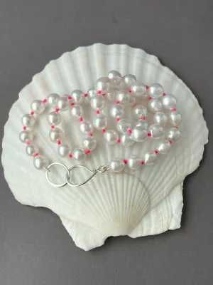 ELEGANT YET FUN - CLASSIC WHITE PEARLS ON NEON PINK KNOTS