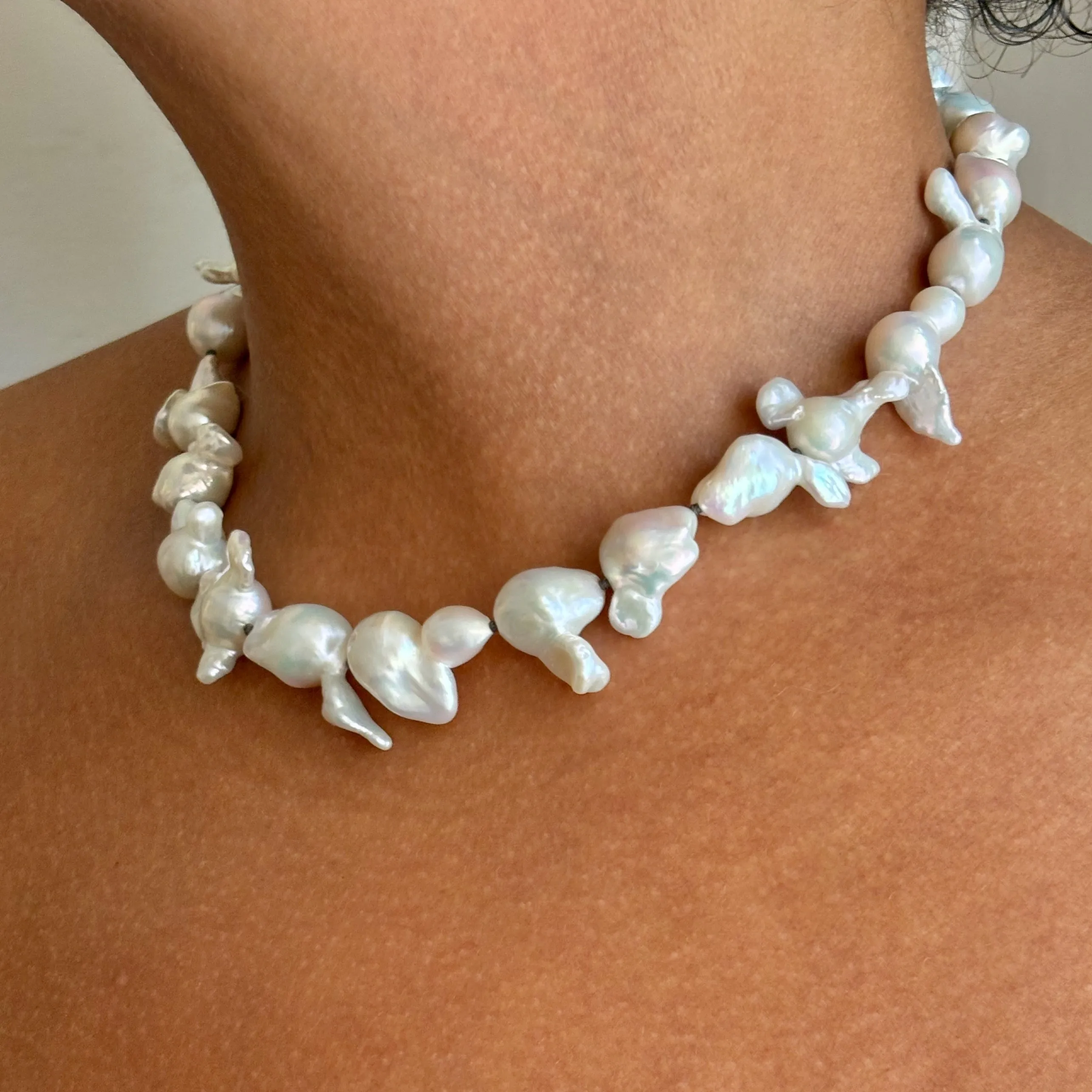 funky white freshwater pearls on dark grey knots