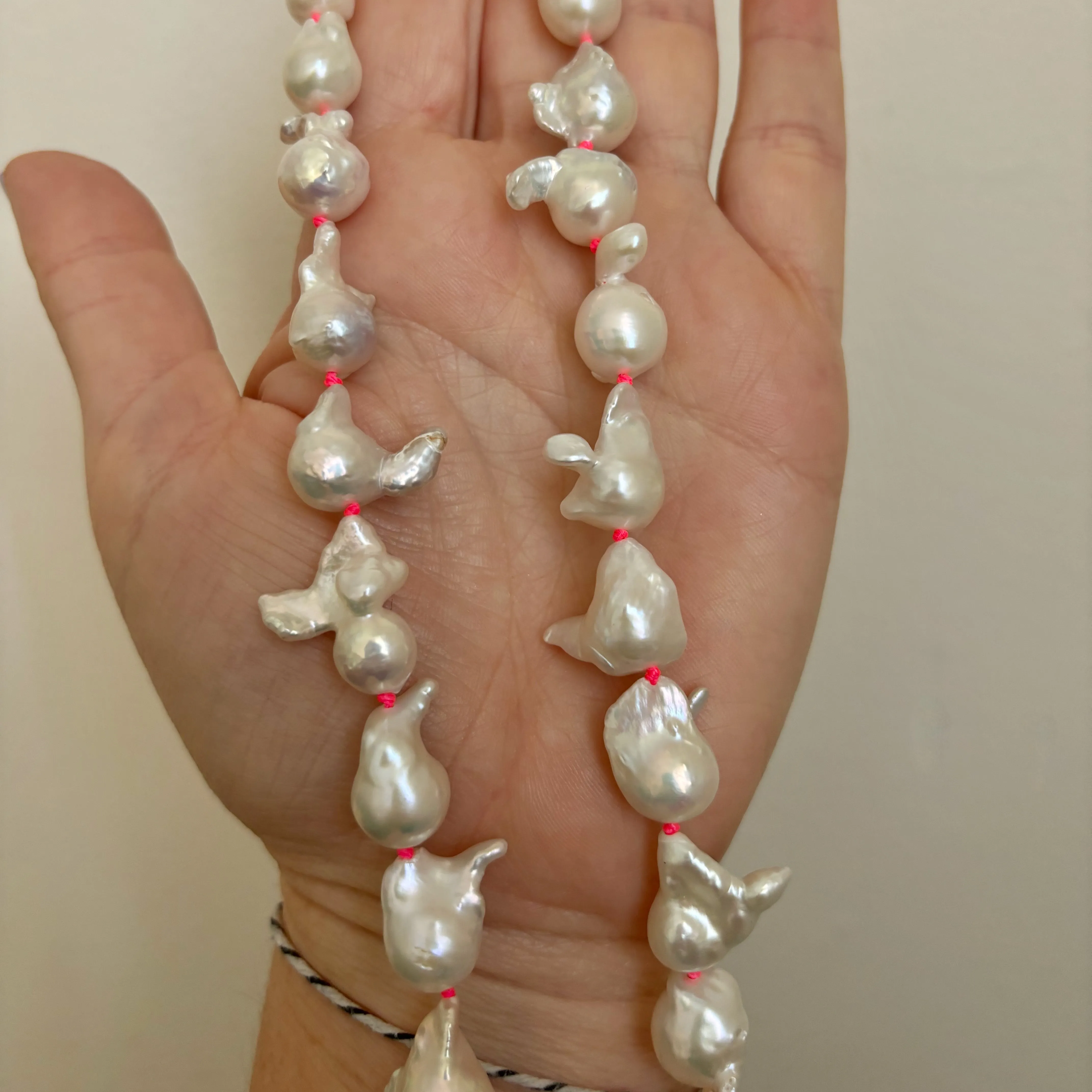 funky white freshwater pearls on neon pink knots